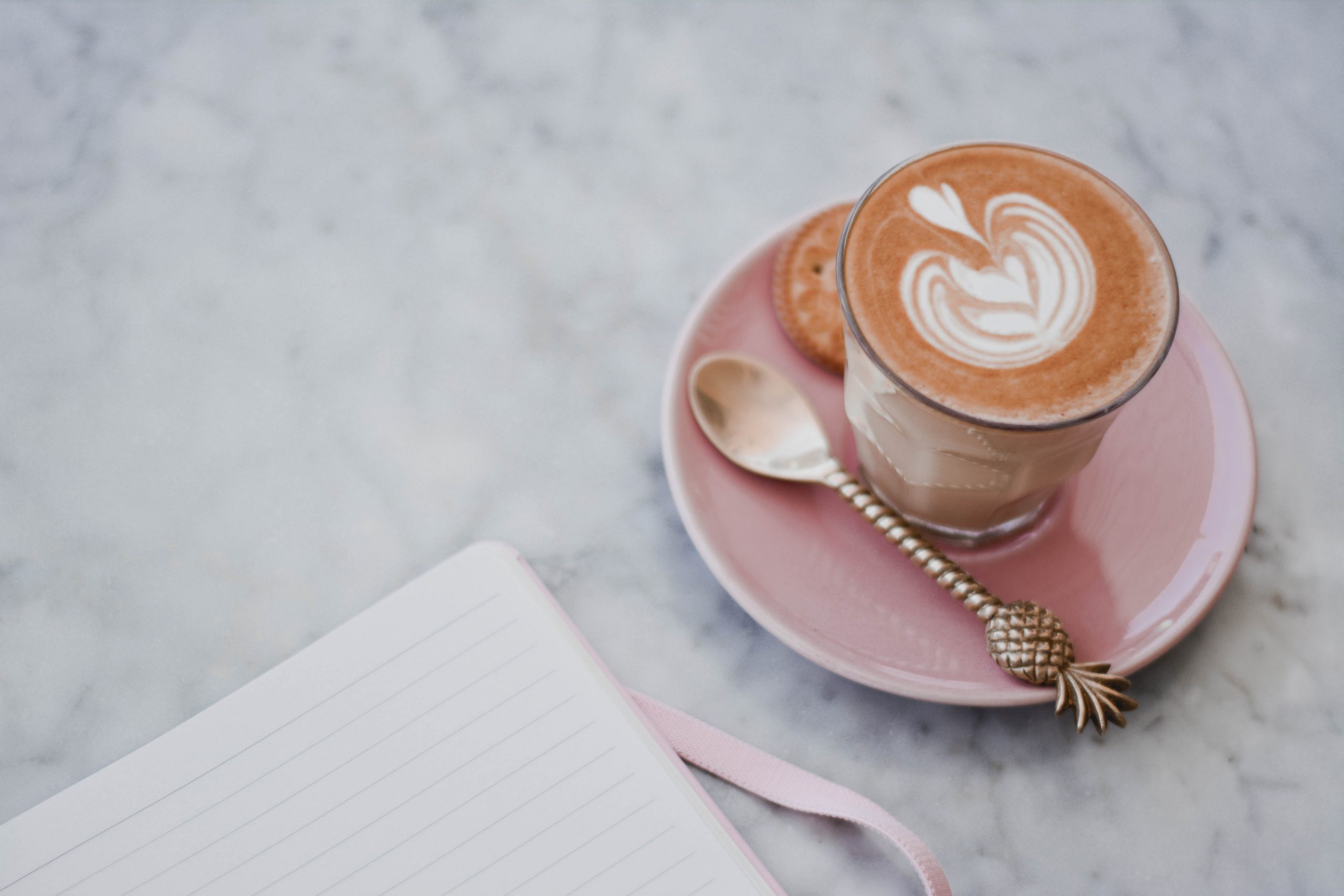 A morning coffee and a journal by Content Pixie